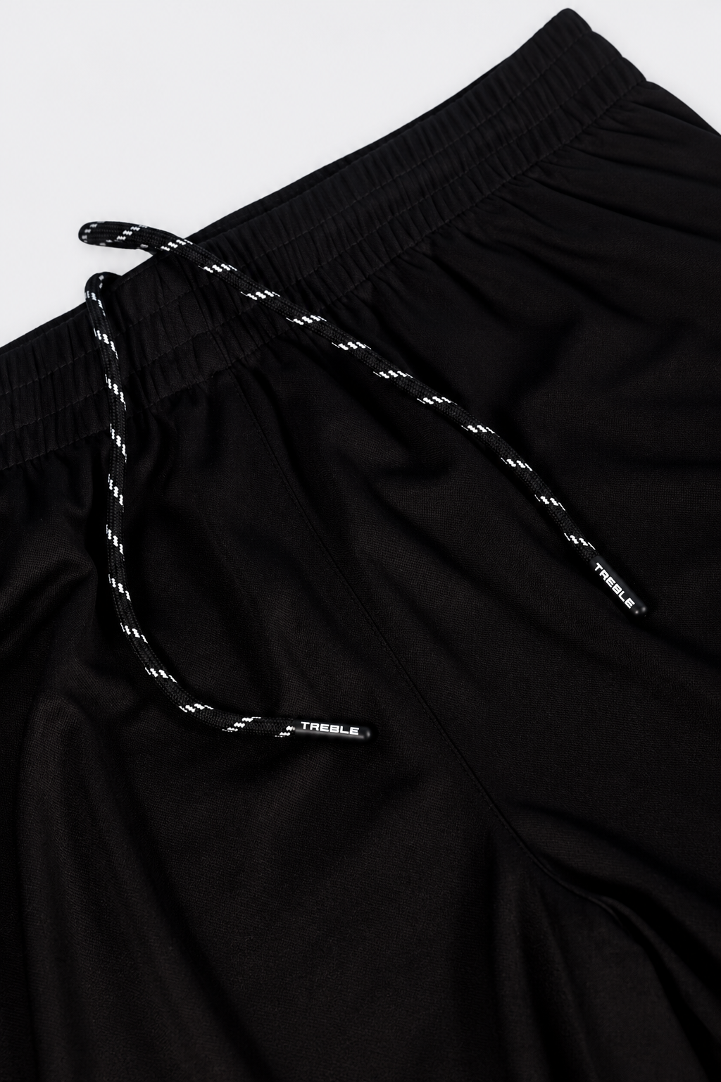 treble branded park unisex premium soccer shorts alternate view portrait product photograph